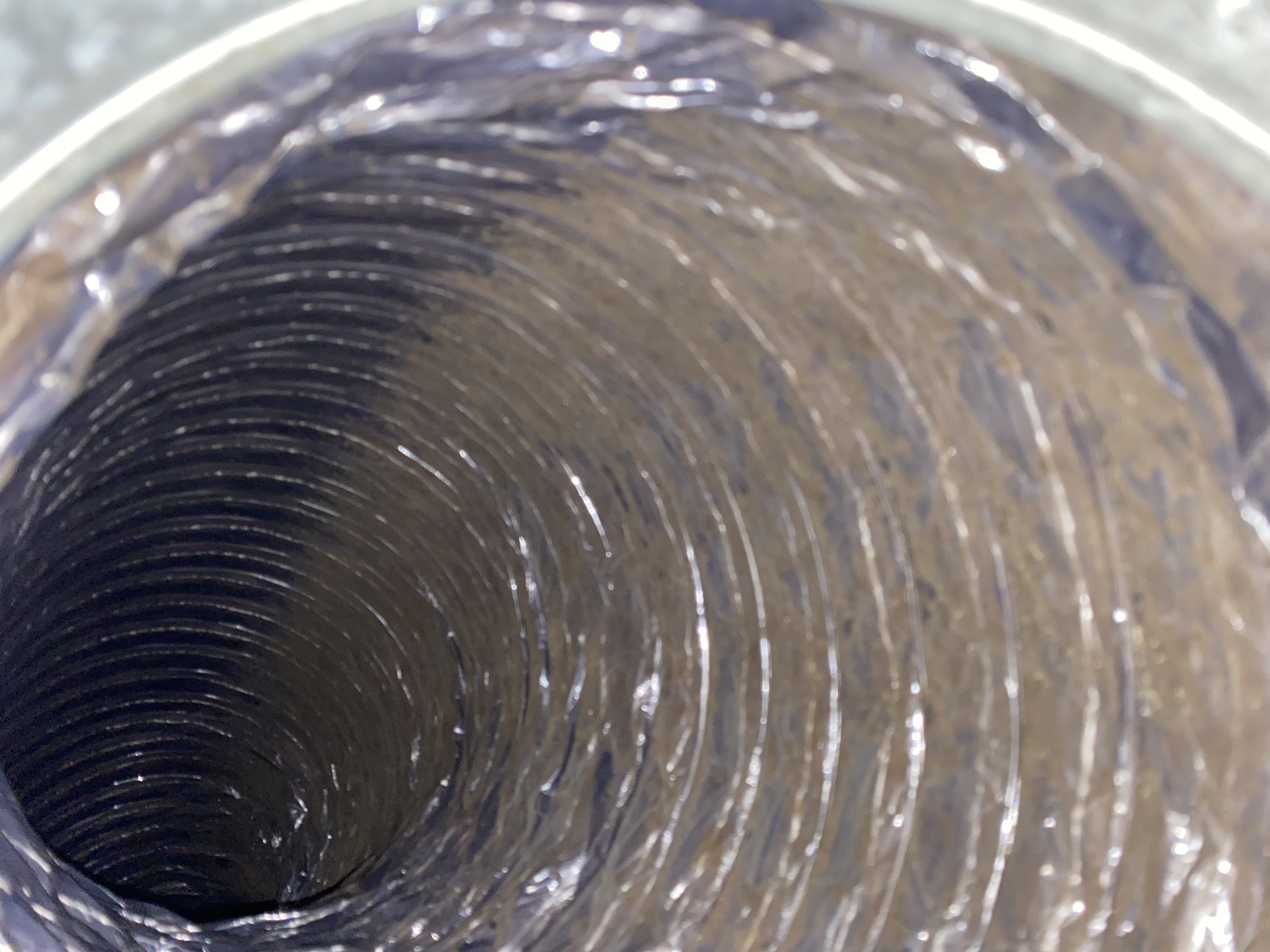 Heavy dust buildup inside a supply air duct, North Naples, FL